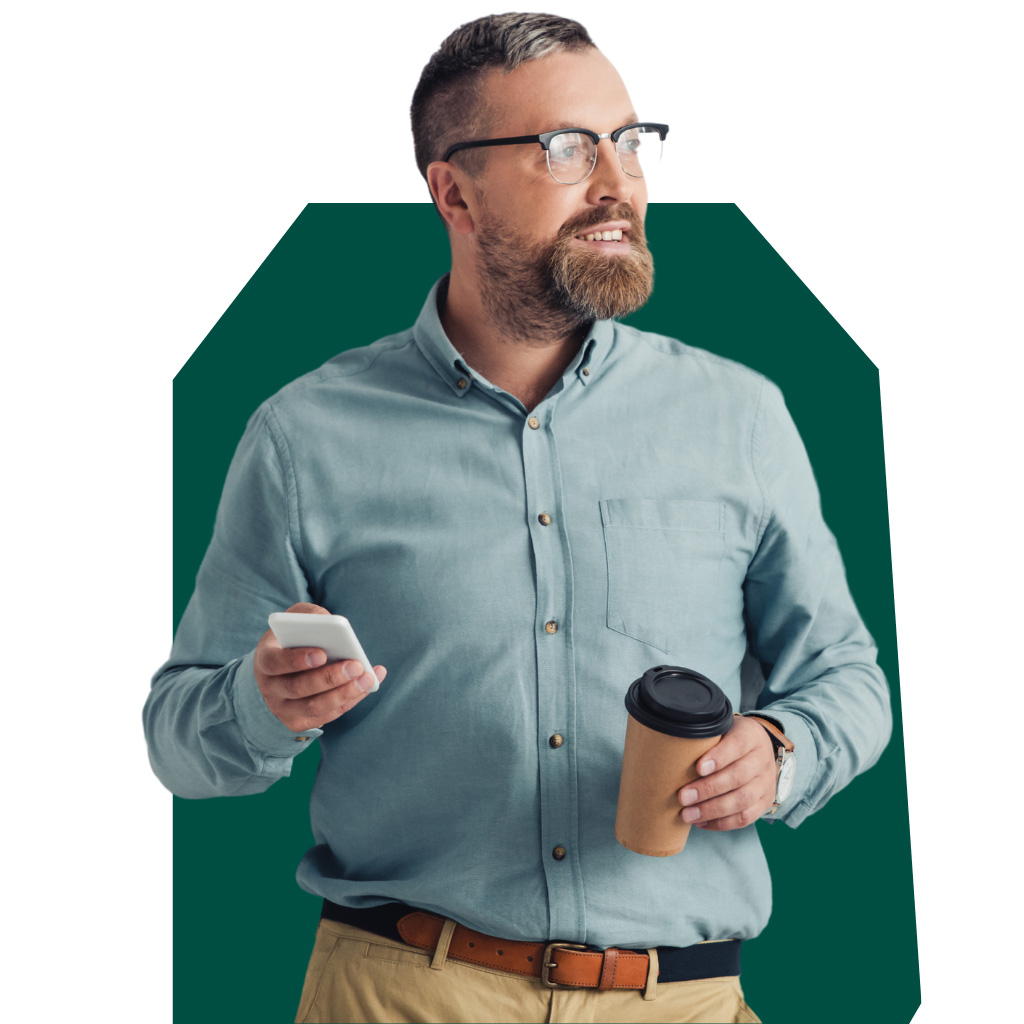 Addison Group website tile featuring a man standing and holding a remote and a cup